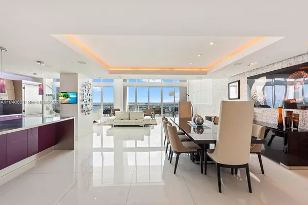 a view of a dining room with furniture