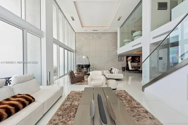 a living room with furniture and a couch