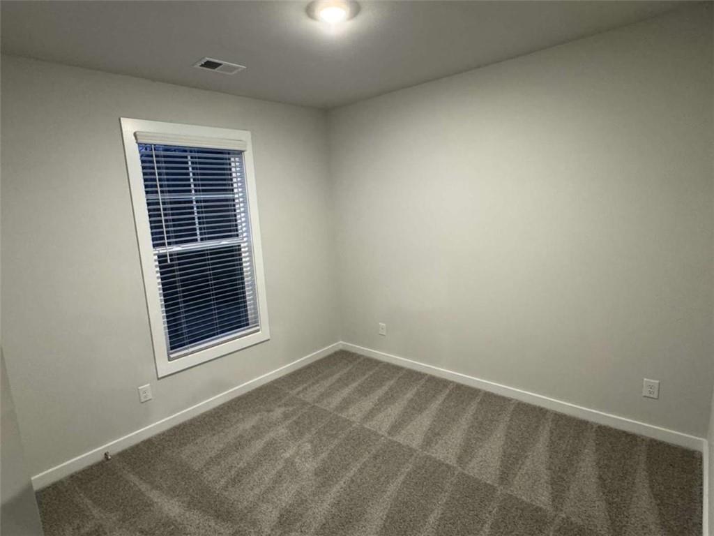 2530 Harbor Ridge Gainesville, GA 30507 - Photo 21 of 44 an empty room with windows