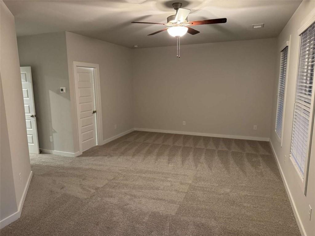 2530 Harbor Ridge Gainesville, GA 30507 - Photo 29 of 44 an empty room with a window and a fan