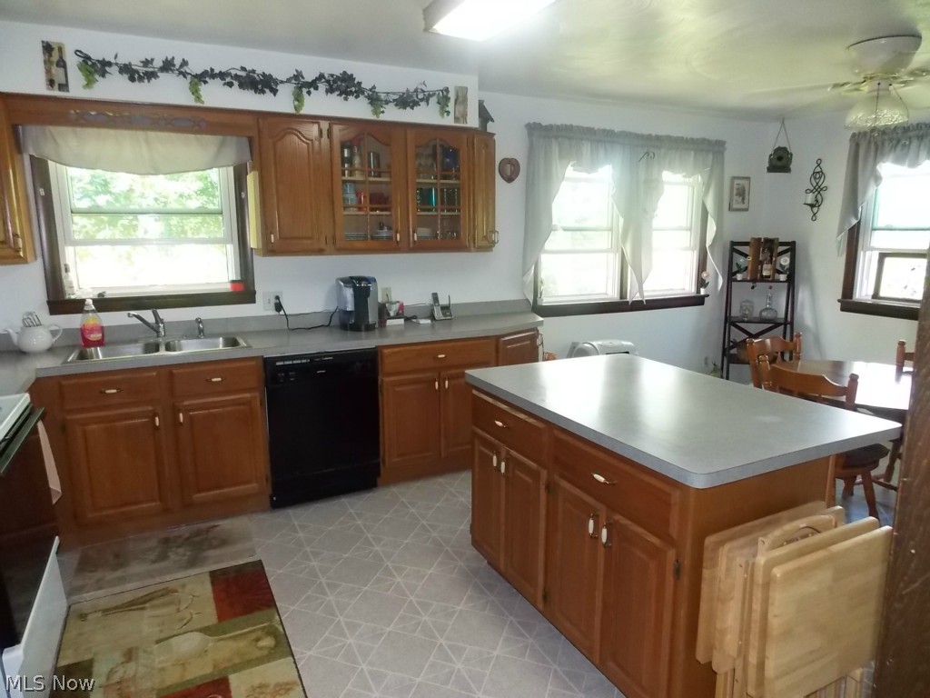 3260 Hartland Center Road Collins, OH 44826 - Photo 3 of 20 Generously-sized, eat-in, kitchen has lots of natural light and takes advantage of views to rear and side of property.