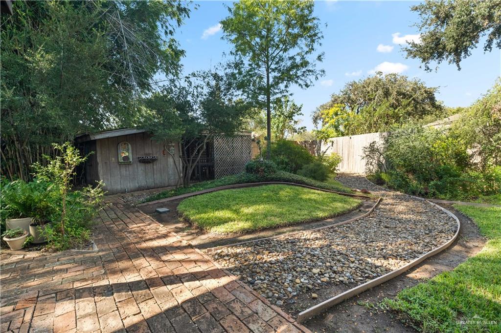 1113 Xanthisma Avenue McAllen, TX 78504 - Photo 24 of 30 View of yard featuring an outdoor structure