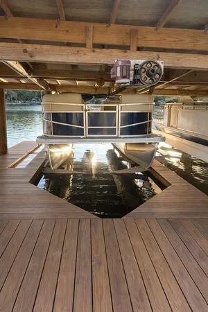 a view of a balcony with wooden floor