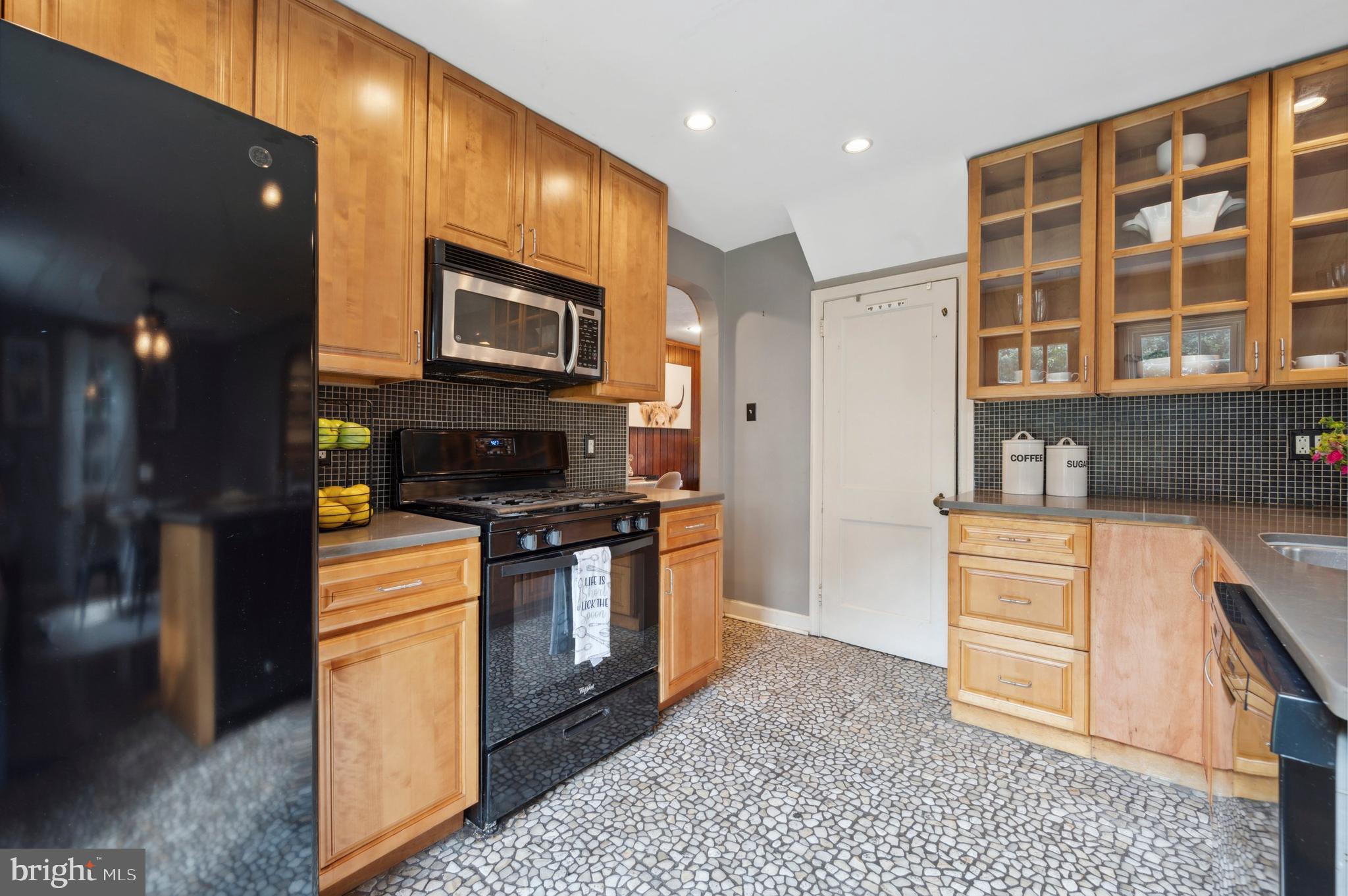 22 Trent Road Wynnewood, PA 19096 - Photo 15 of 41 A kitchen with a lot of wood cabinets for storage