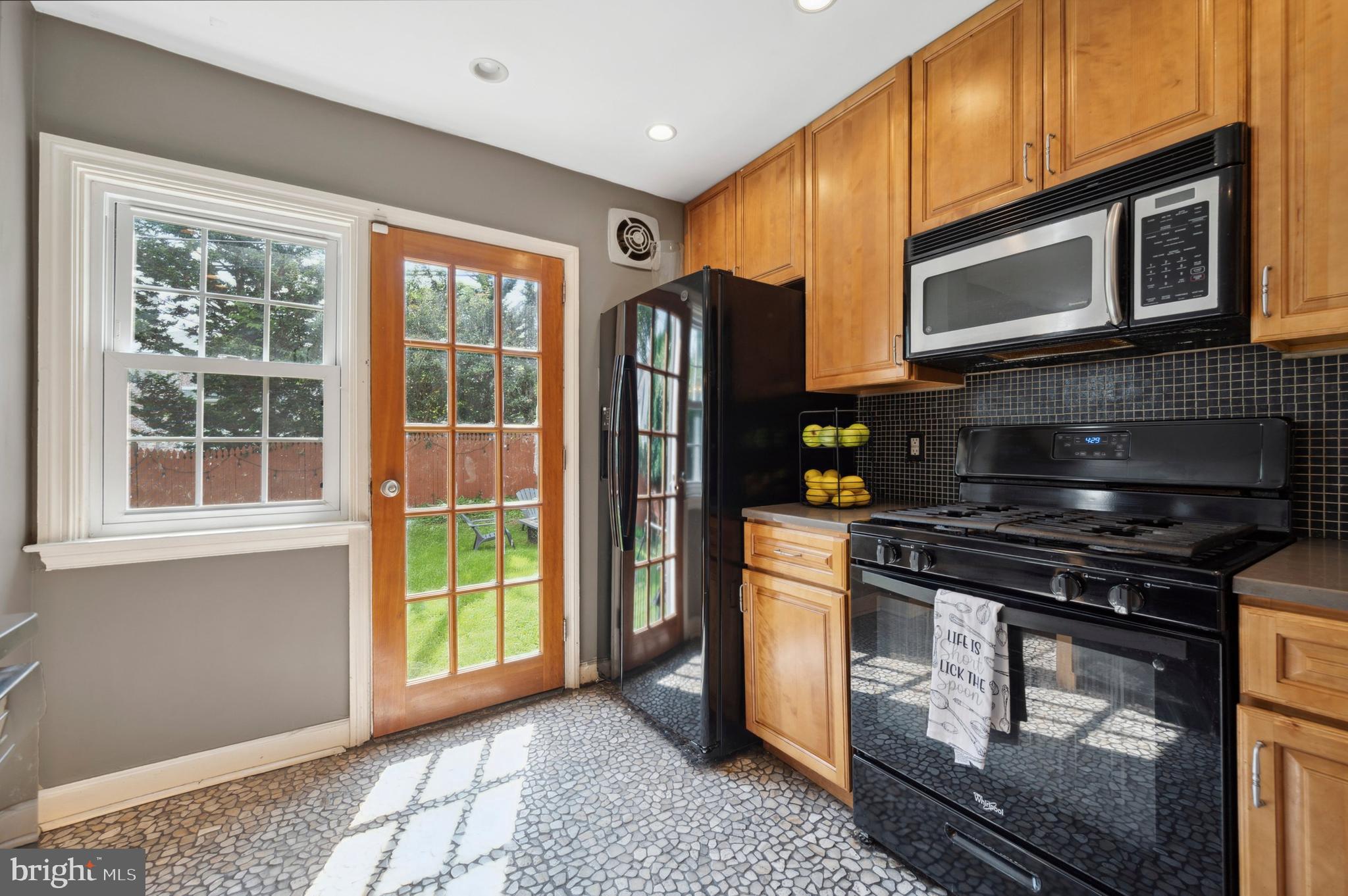 22 Trent Road Wynnewood, PA 19096 - Photo 18 of 41 Kicthen with the Exit Door to the Backyard