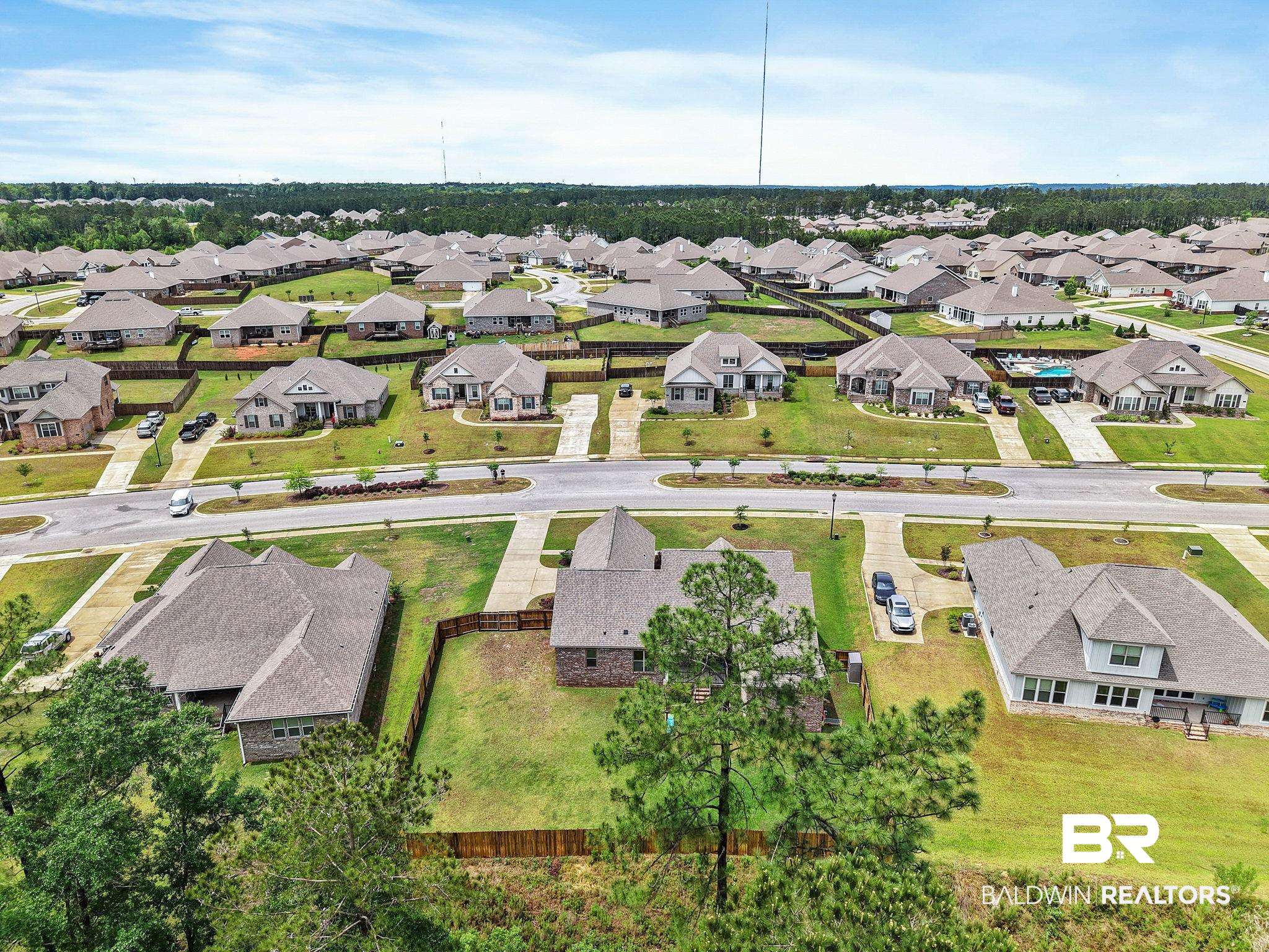 13233 Ibis Boulevard Daphne, AL 36527 - Photo 75 of 100 Expansive residential development featuring numerous single-story homes with pitched roofs and manicured lawns