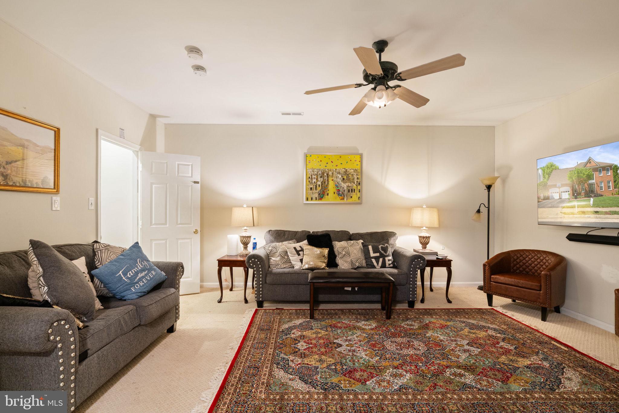 7616 Seabrook Lane Springfield, VA 22153 - Photo 31 of 35 Cozy living space with warm ambiance.