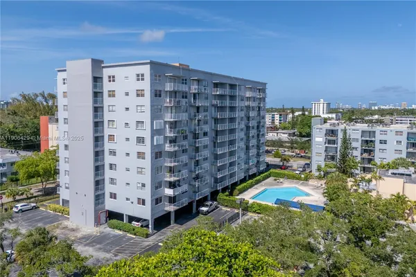 a view of a city with tall buildings