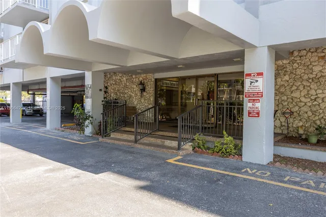 a view of a brick house with a large windows