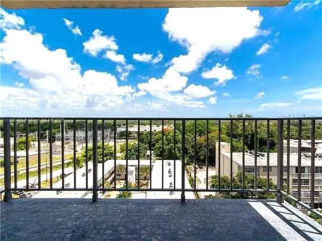 a view of swimming pool with outdoor seating