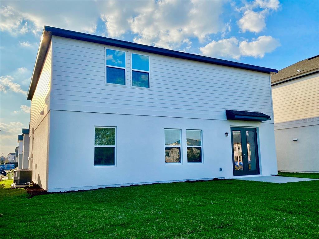 2190 Derwent Drive Davenport, FL 33896 - Photo 23 of 30 a front view of house with yard