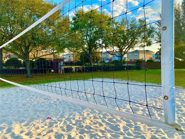 a view of a park with swings and slides