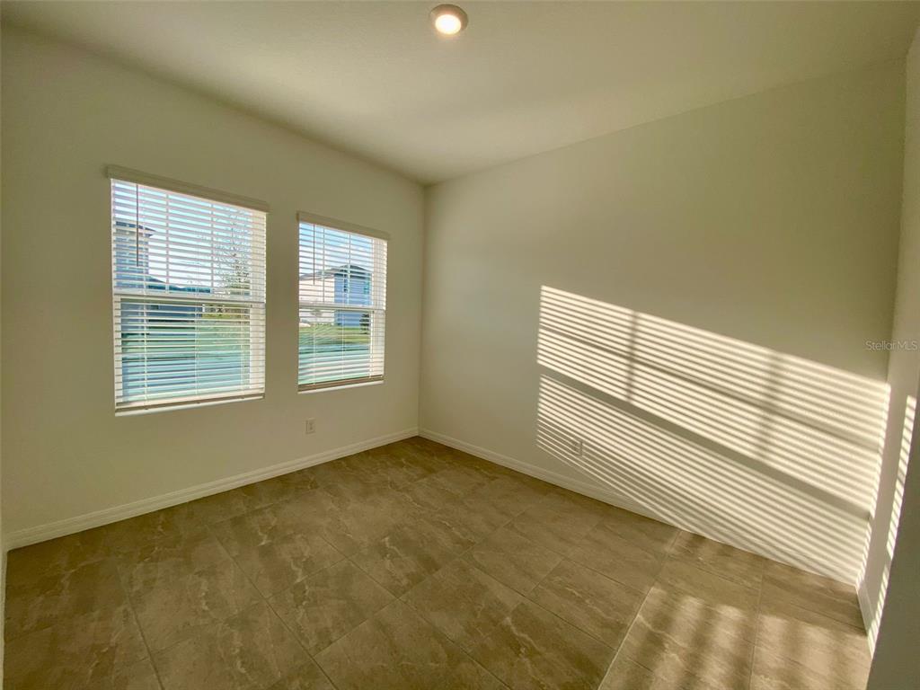 2190 Derwent Drive Davenport, FL 33896 - Photo 9 of 30 a view of an empty room with a window
