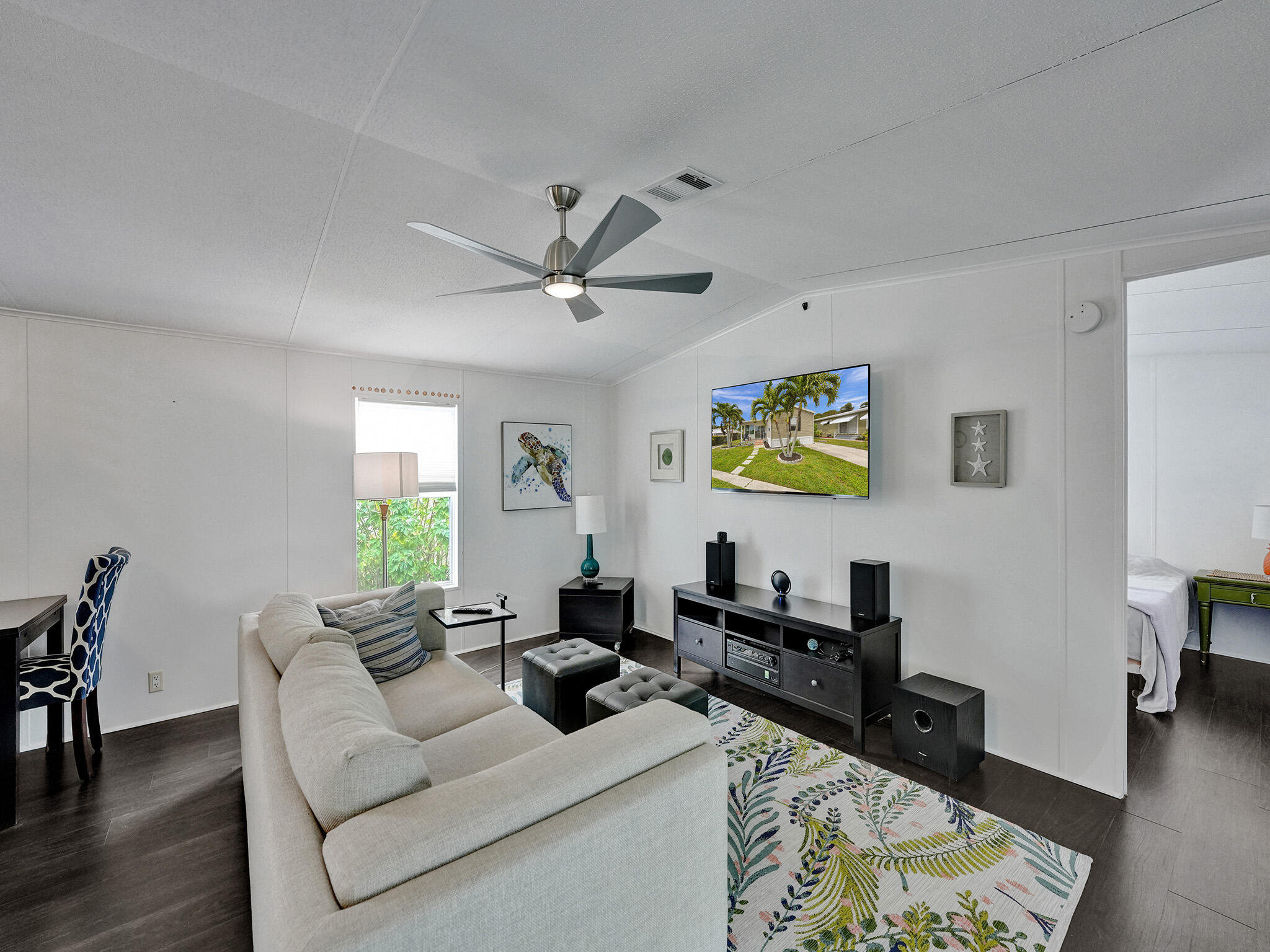14609 Sunset Drive Delray Beach, FL 33445 - Photo 25 of 50 a living room with furniture and wooden floor