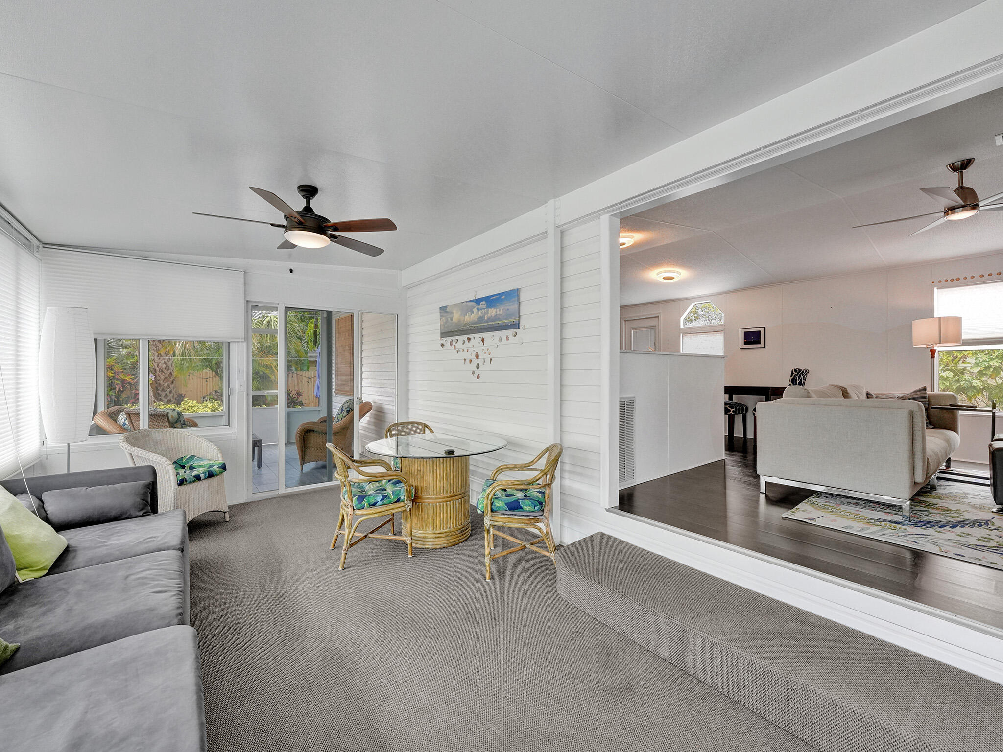 14609 Sunset Drive Delray Beach, FL 33445 - Photo 37 of 50 a living room with furniture and a large window