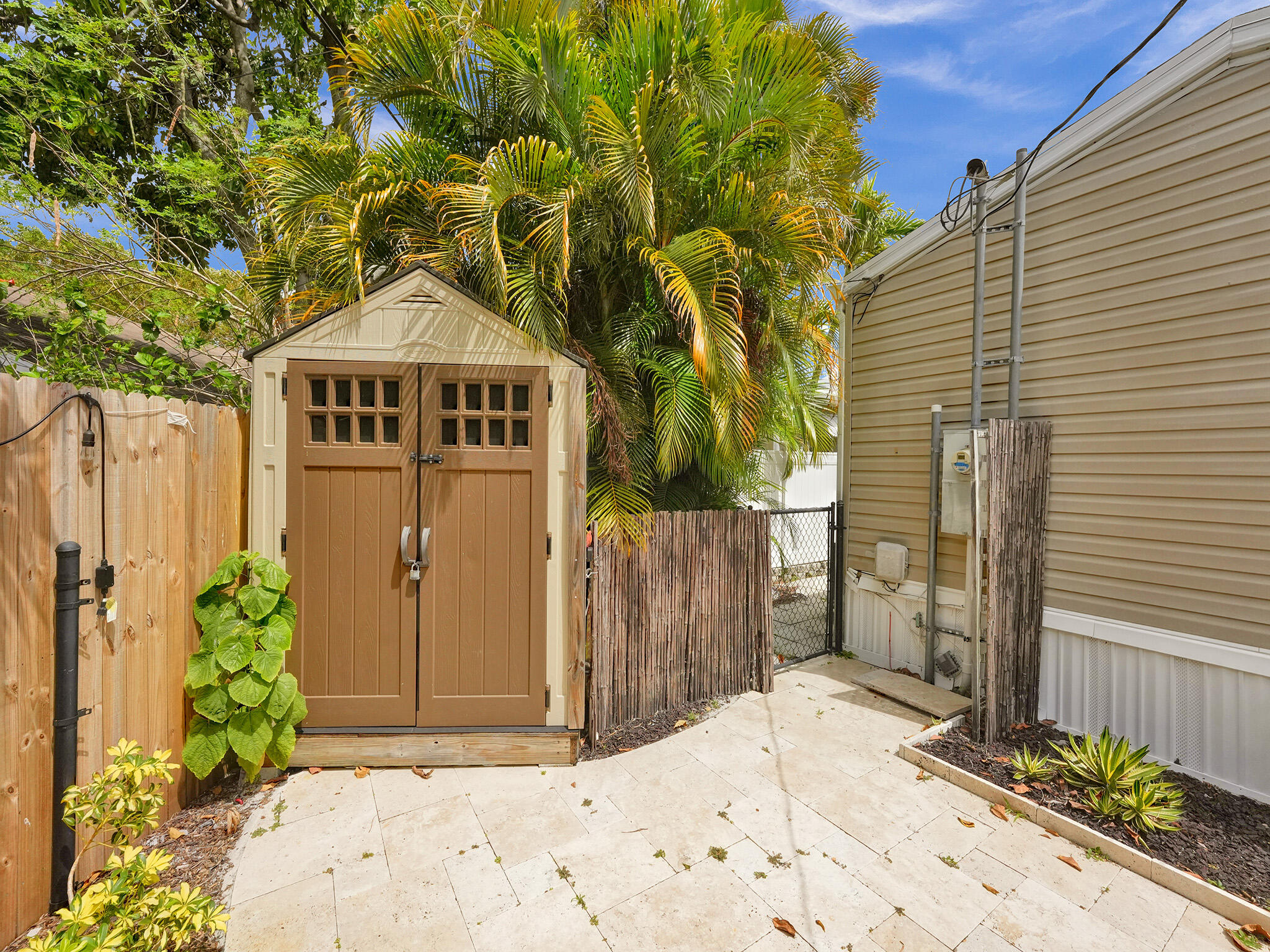 14609 Sunset Drive Delray Beach, FL 33445 - Photo 7 of 50 a front view of a house with a yard