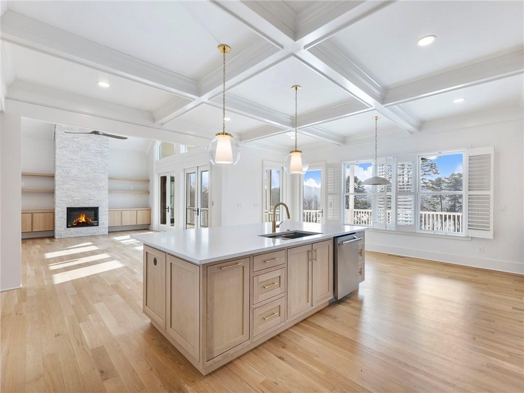 5651 Old Wilkie Road Gainesville, GA 30506 - Photo 20 of 78 a large kitchen with stainless steel appliances kitchen island a large island in the center and a large window