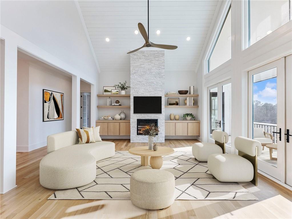 5651 Old Wilkie Road Gainesville, GA 30506 - Photo 24 of 78 a living room with furniture a fireplace and a flat screen tv