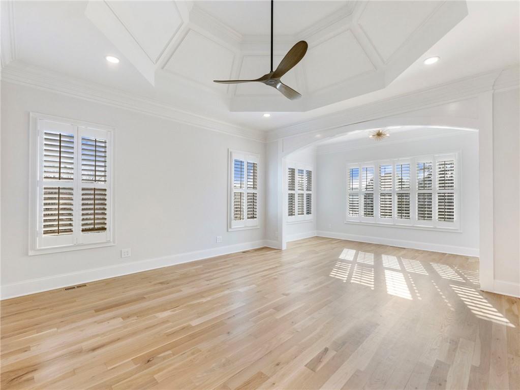 5651 Old Wilkie Road Gainesville, GA 30506 - Photo 25 of 78 a view of an empty room with wooden floor and a window