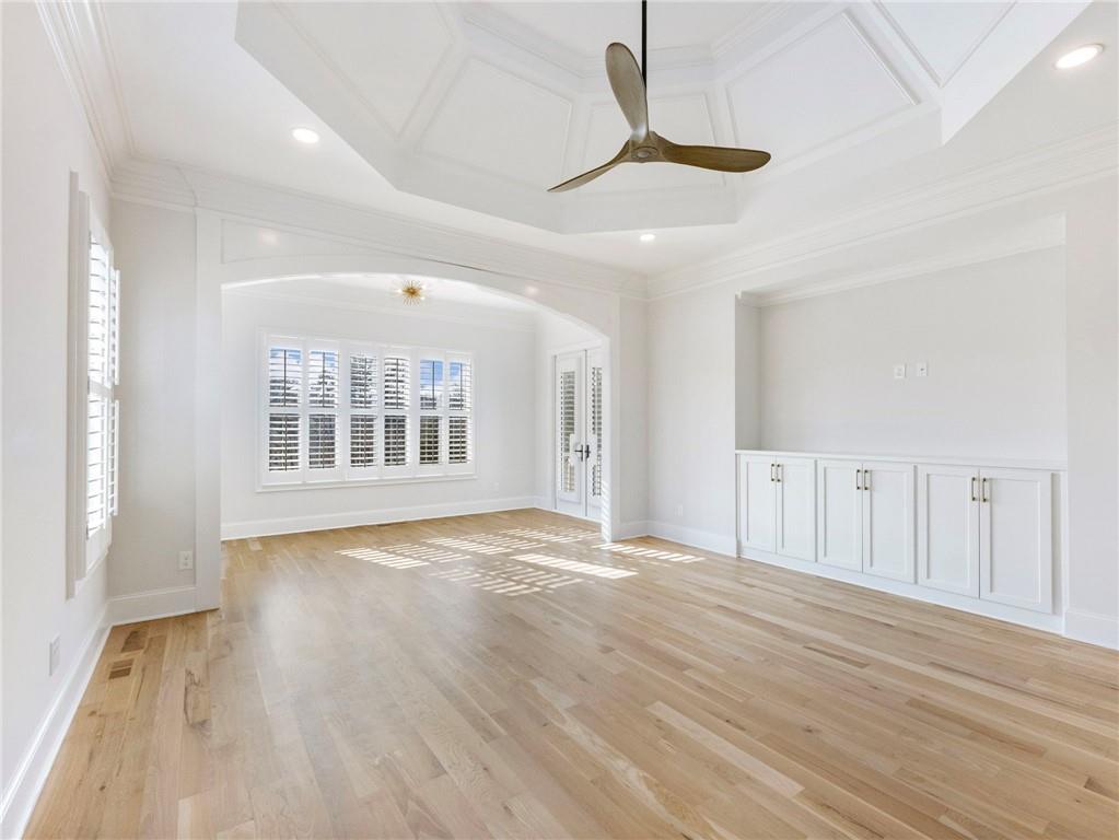 5651 Old Wilkie Road Gainesville, GA 30506 - Photo 26 of 78 a view of an empty room with wooden floor and a window