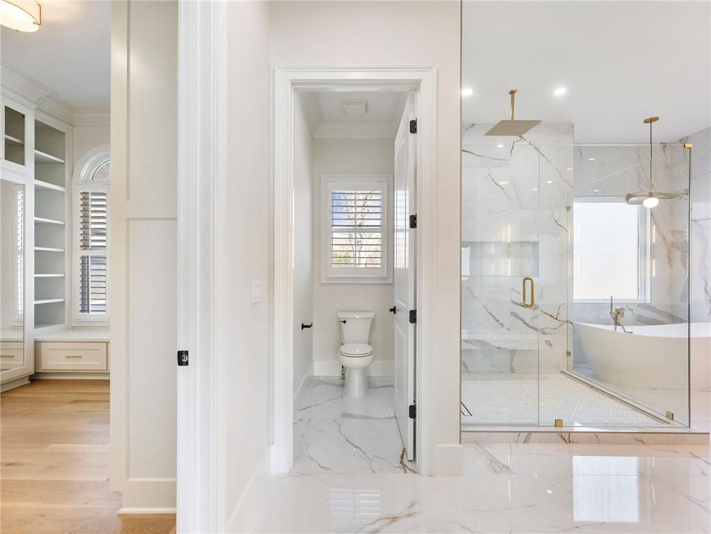 5651 Old Wilkie Road Gainesville, GA 30506 - Photo 31 of 78 a bathroom with a glass shower door and a sink