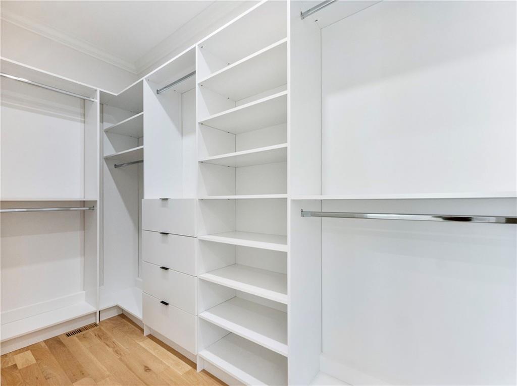 5651 Old Wilkie Road Gainesville, GA 30506 - Photo 36 of 78 a view of walk in closet with empty racks