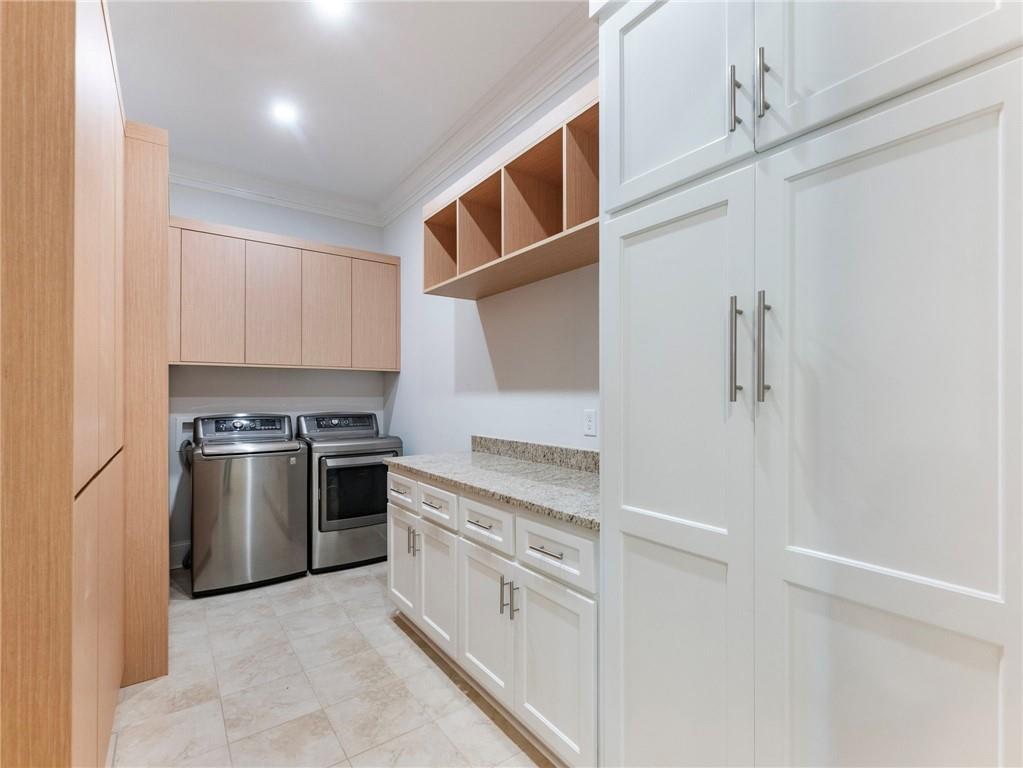 5651 Old Wilkie Road Gainesville, GA 30506 - Photo 45 of 78 a kitchen with a stove top oven and cabinets