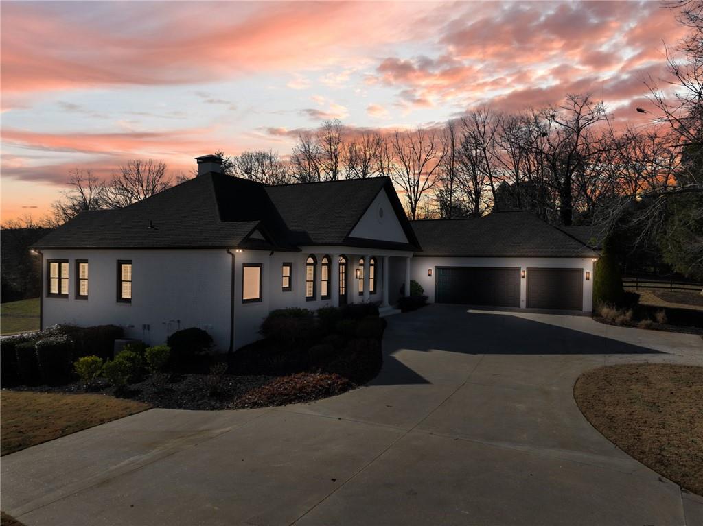 5651 Old Wilkie Road Gainesville, GA 30506 - Photo 68 of 78 a front view of a house with a yard