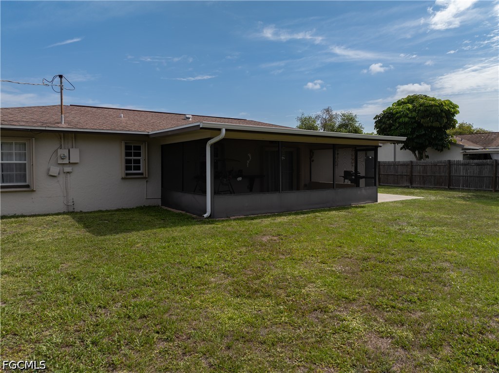 4960 20th Place Southwest Naples, FL 34116 - Photo 27 of 33 a backyard of a house with lots of green space