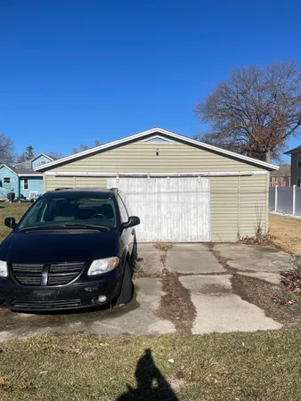a car parked in front of a house