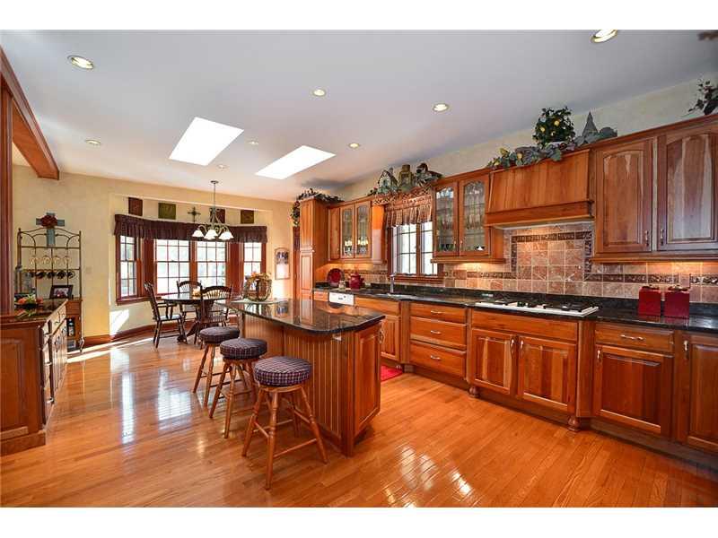 515 Seabright Road McDonald, PA 15057 - Photo 8 of 25 Kitchen. WHAT A KITCHEN - A CROWD PLEASER FOR ANY GOURMAND OR EVERYDAY COOK! CHERRY WOOD CABINTERY, GRANITE COUNTERSPACE GALORE, SUNFILLED BREAKFAST AREA