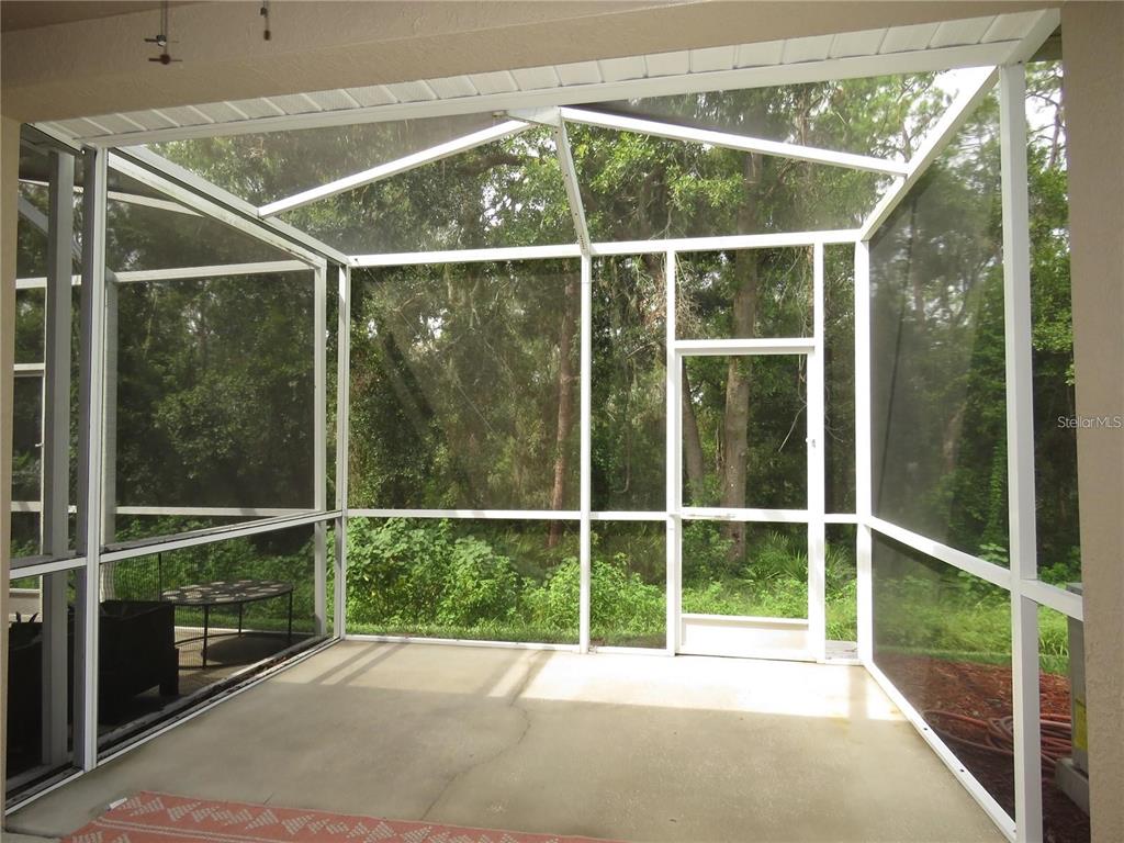 5868 Fishhawk Ridge Drive Lithia, FL 33547 - Photo 12 of 12 a view of a glass door with a room