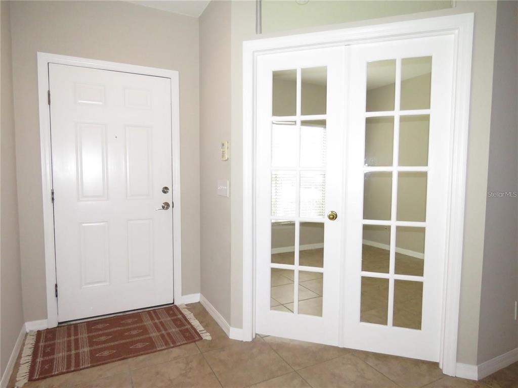 5868 Fishhawk Ridge Drive Lithia, FL 33547 - Photo 3 of 12 an empty room with windows
