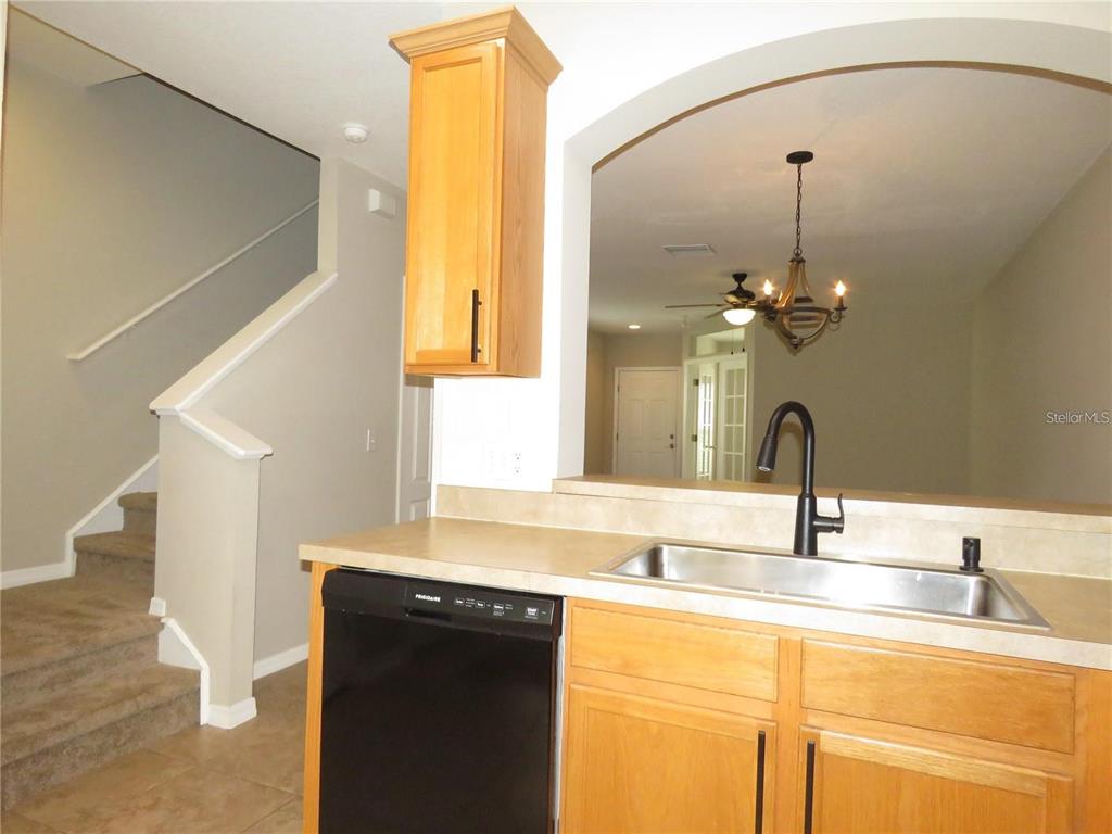 5868 Fishhawk Ridge Drive Lithia, FL 33547 - Photo 5 of 12 a bathroom with a sink and a mirror