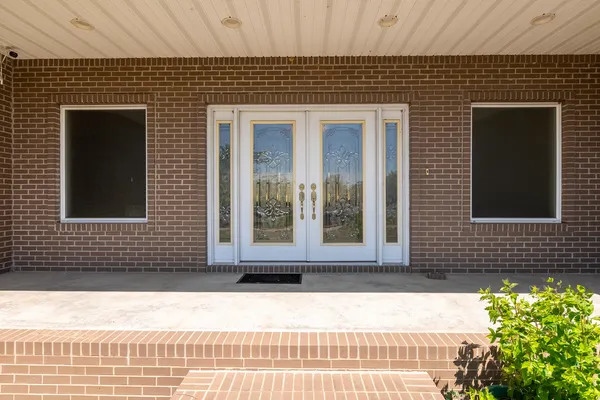 a view of entrance door of a house