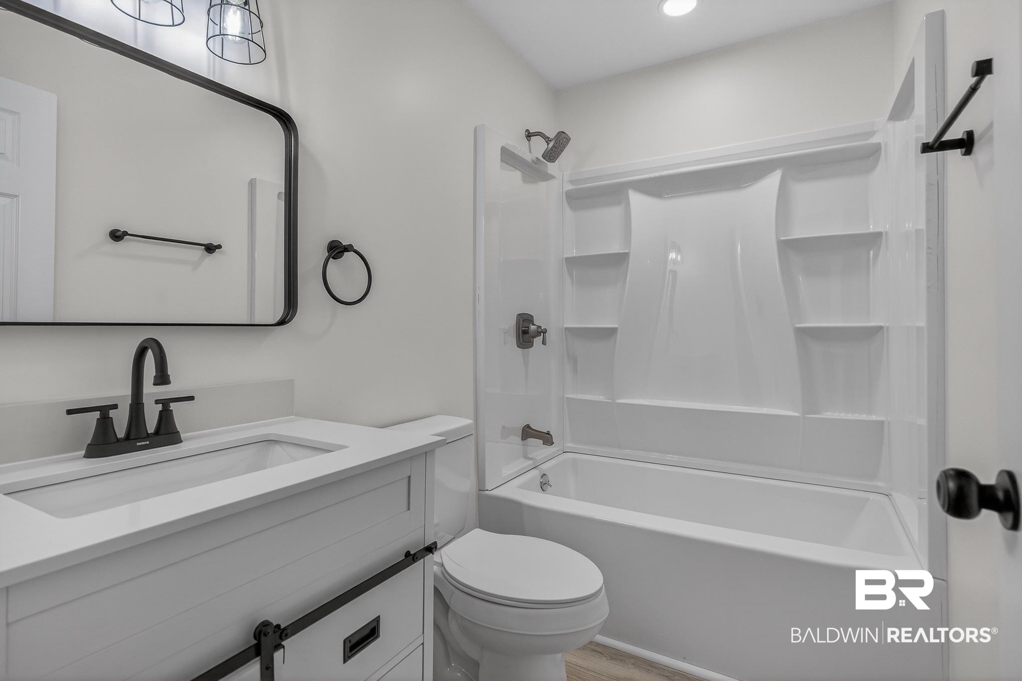 10650 Old Pascagoula Road Theodore, AL 36582 - Photo 48 of 77 Full bath with shower / bath combination, vanity, and light wood-style floors