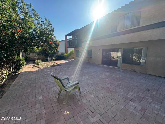 a small garden covered with tall trees