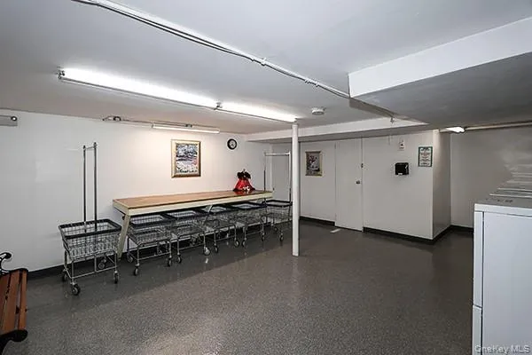 a room with furniture and air hockey table