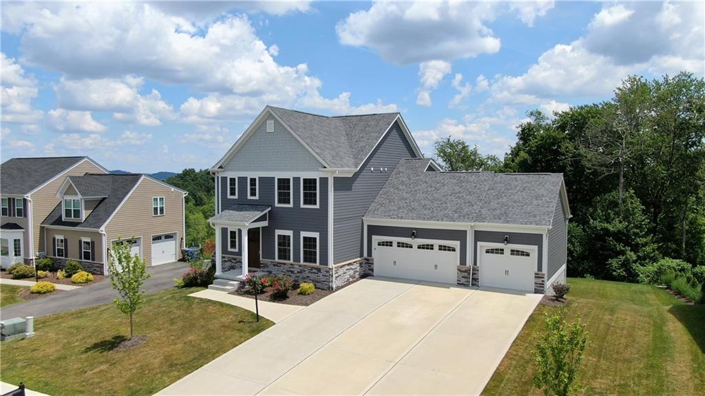 This custom-built home has stunning hilltop views.