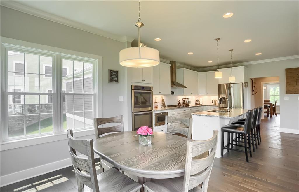 130 Vista Ridge Lane Valencia, PA 16059 - Photo 8 of 25 An eat in dining area features bright windows overlooking the serene, mature homesite.
