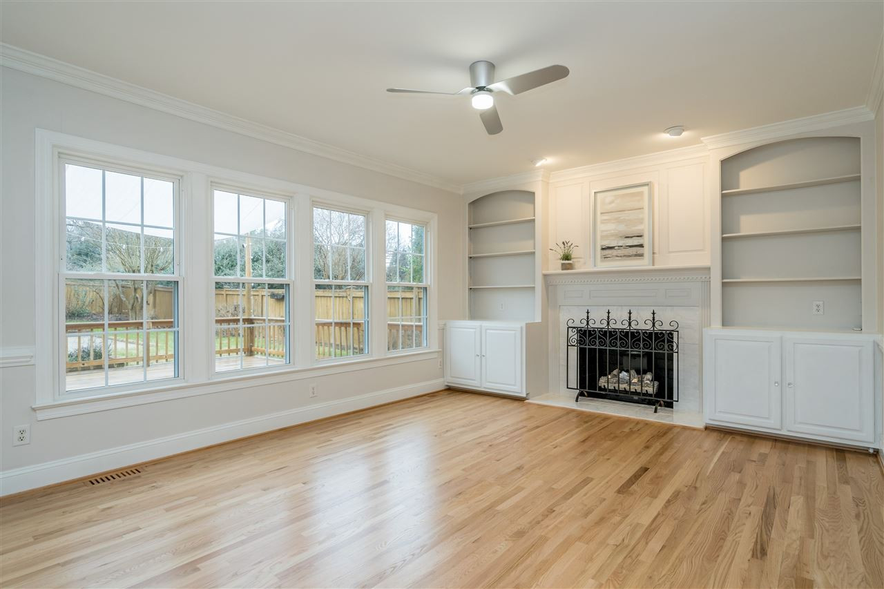 6916 Darcy Lane Raleigh, NC 27606 - Photo 5 of 30 Family room with built in bookcases and gas fireplace. Den/Family/Great Room
