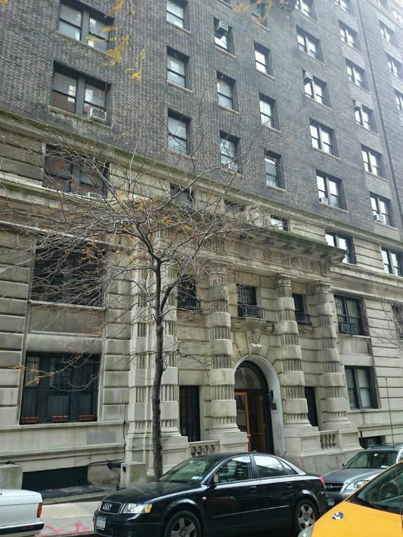 Undisclosed Address Manhattan, NY 10025 - Photo 2 of 2 a front view of a building with parking space