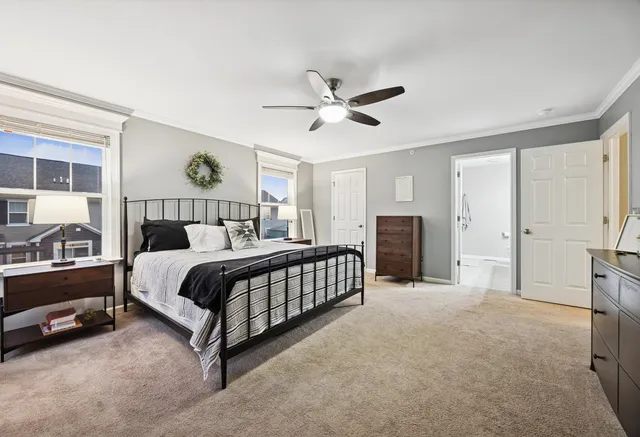 a living room with furniture flat screen tv and a fireplace