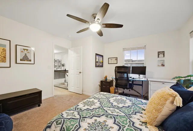 a view of a hallway with closet and utility room