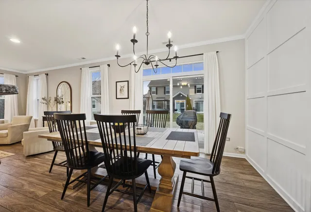 a kitchen with stainless steel appliances a refrigerator stove and microwave