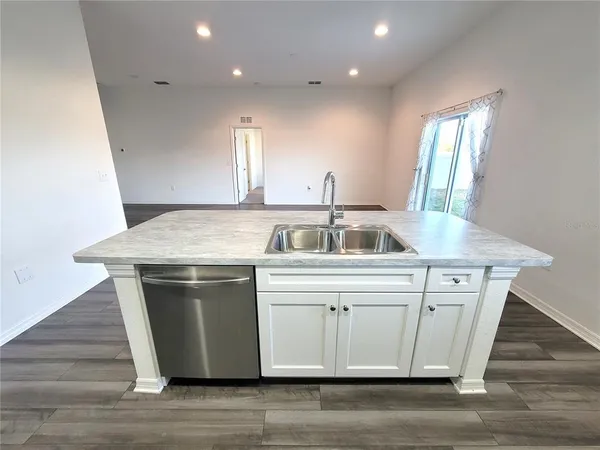 a view of living room with granite countertop furniture