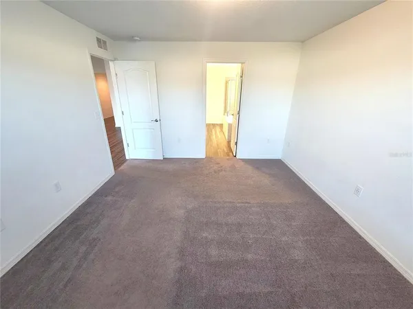 a view of a room with an empty space