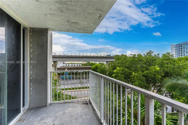 a view of balcony with patio