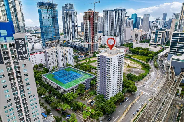 a view of a city with tall buildings