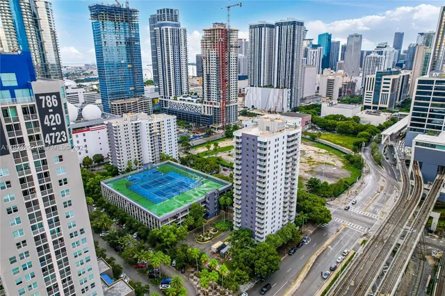 a view of a city with tall buildings
